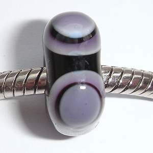 A square bead in black and purple