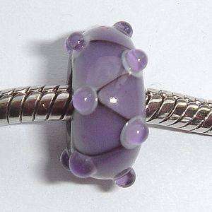 Black base with purple triangles and dots