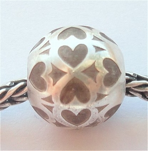 Sterling silver bead with little hearts, antique finish