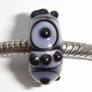 Black with purple spots, circles and dots