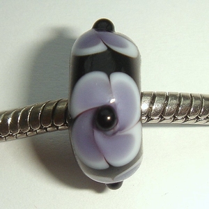 Black with purple turnings and a black dot