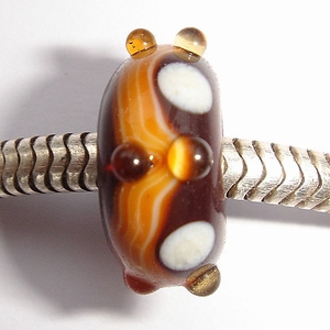 Brown with amber lines and dots