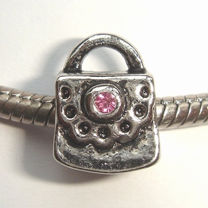 Handbag with pink zirconia