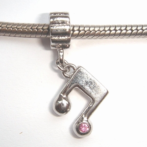 Pendant music notes with pink zirconia