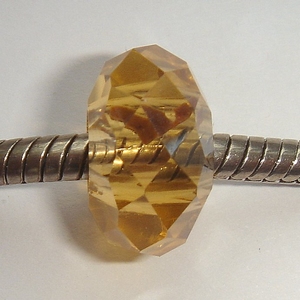 Facceted glass topaz, amber