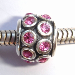 Cilindertje met roze zirconia's