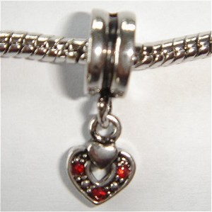 Pendant with little heart and red zirconia's