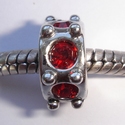 Six angular with red zirconia's, borthstones of januari 