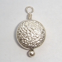 Sterling silver pendant round, flat and hammered 