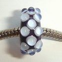 Cobalt blue with white spots with a dot clear on it 