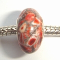 Fossil bead oranjerood met bruin 