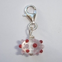 Clear base with red an white dots 