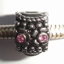 Clip with dots and pink zirconia's 