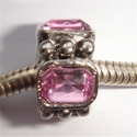 Cylinder with big pink zirconia's and dots 