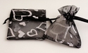 Organza bag blackwith silver hearts 