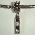 Pendant with bar with 2 black and 2 white zirconia's 